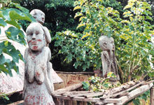 Jarai spirit sculptures surround a village grave site. Jarai is one of 54 minority groups in Vietnam.
