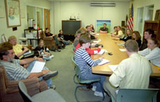 During orientation on March 4, students discuss their upcoming study abroad trips to England.
