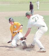 Senior third baseman Mark Keister attempts to tag out Kurt Waller of Missouri Western during the April 13 game. Southern lost 21-13.
