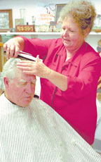 James Long, of Diamond, has had Kay Cargile cut his hair for more than 20 years.

