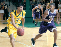 Hiram Ocasio, junior guard, takes the ball down the court Jan. 21 against the Southwest Baptist University game. Ocasio moved up to second in all-time steals in Missouri Southern history.
