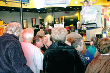 A crowd standing in line at Northstar 14 Theaters waits to get seats to Mel GibsonÂ´s new controversial movie The Passion of The Christ. The film opened Feb. 25.
