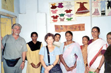 Dr. William Kumbier, professor of English, Dr. Ree Wells, associate professor of sociology, and guide Raja Rajeswari (right center) visited workers at the Shankernager Peace Through Empowerment Center, where Hindu and Muslim women work together.
