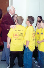 B.W. Robinson seats a group of elementary school students during a session of the Missouri Senate. Robinson has been the doorman for the past 21 years.
