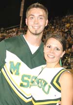 Grahm and Candice Dickinson are the only married members of the Missouri Southern cheer team.
