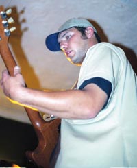 The guitarist for kansas City ock band The Large plays to a crowd on Sept. 11 at the URT

