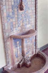 A mosaic tile fountain still remains in the Mansion.
