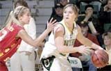 Junior gaurd Nicole Greninger circles around the outside of the key during the Fe. 23 game against Pitt State at Missouri Southern.
