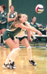 Sophomore outside hitter Sarah Hoffmeister bumps the ball during the Aug. 27 game against Henderson State University.
