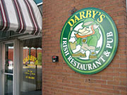 Darby the leprechan stands watch outside of DarbyÂ´s Irish Restaurant and Pub.
