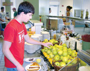 Dan Fedewa, freshman meterological sciences major serves himself a meal among the available dining hall food.
