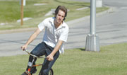 Pablo Zakovan, senior business administration major, rides his bike to class from the residence halls.
