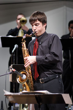 Kyle Babbit, freshman secondary education major, plays saxophone. Some members were given the chance to perform solos.
