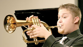 Tom Smith, sophomore secondary education major, plays trumpet during the Nov. 29 jazz concert.
