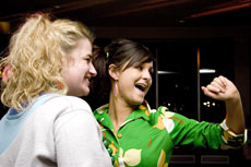 Ashley Baird, junior dental hygiene major (left), and Carrie Staudt, junior mass communications major, dance during the night to make sure Alpha Sigma Alpha wins the prize for having the most members at a Campus Activities Board-sponsored event Feb. 16.
