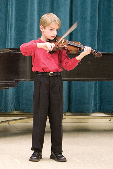 Glenn Sigler, age 7, Joplin, has played the violin for two years.
