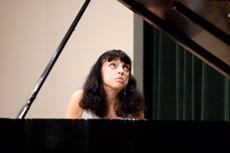In an ironic twist, Natalya Antonova, professor at the Eastman School of Music, played before the very contestants she was to judge in the Missouri International Piano Competition.
