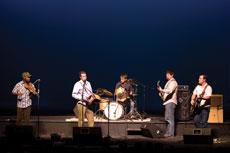 (From left to right) Cedric Watson, fiddle; Wilson Savoy, accordion; Drew Simon, drums; Blake Miller, bass guitar; Jon Bertrand, guitar, played Tuesday night in Taylor Auditorium.
