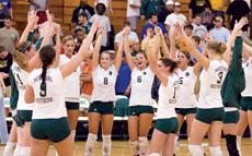 The Missouri Southern volleyball Lions come together during a match at the Leggett & Platt Athletic Center.
