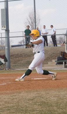 Freshman third baseman Lindsay Bellm rips a single down the line. The Lions will be in action this weekend in the Missouri Western Tournament.
