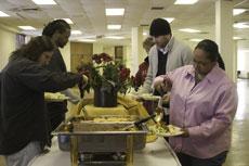 Students fill their plates at the buffet at the Martin Luther King Jr. luncheon before Mark Lloyds speech Feb. 5.
