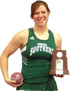 Jessica Selby shows off her second-place trophy from the NCAA Division II indoor track championships.

