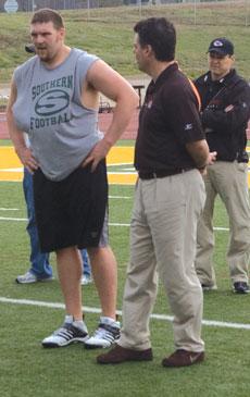 Allen Barbre goes through drills under the coaching of an offensive line coach from the Cleveland Browns during his Pro Day event last Friday.
