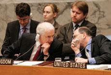 Jones Parry, Britains Ambassador to the United Nations, left, speaks with U.S. Ambassador to the United Nations Alejandro Wolff before a United Nations Security Council vote Saturday, March 24, 2007 at the UN headquarters.
