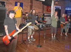 (left to right) RJ Jennings, bass guitar; Tom Smith, special guest on trumpet; Melvin X, special guest on percussion; (behind Melvin) Nate Robusto, drums; Josh Mullen, lead vocals and Forrest Stockton, guitar. On March 31st Cinna the Poet played its second CD release show at Joplins Nightlife.
