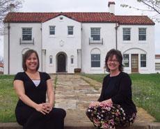 Elisa Bryant, almuni relations coordinator, and Lee Elliff Pound, director of the Missouri Southern Alumni Association, pose in front of the Mission Hills Mansion. The Alumni Association coordinated with the strategitic committee and the Board of Governors on the project. The Mansion will host an opening tour of the Mansion April 29.
