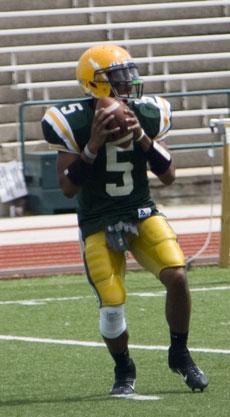 Sophomore quarterback Roland Thompson looks for an open receiver.
