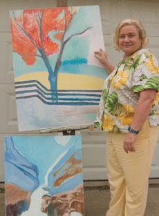 Dr. Carolyn Hale displays her artwork outside her home. Hales inspiration for her art comes from her travels through the McCaleb Initiative for Peace.
