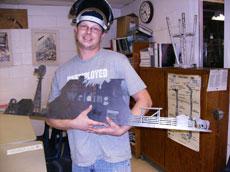 David Beebe, of the Franklin Technology Institute displays a pice of welded art work by Chuck Sexton.
