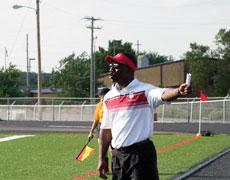 Coach Nii Abrahams calls directions to his Carl Junction soccer team during practice, Sept. 7.
