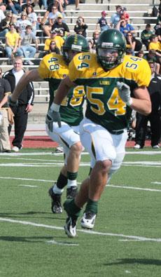 Jared Brawner (54) and Rudy Mascaro (48) chase down a Fort Hays runner during Southerns Homecoming game Oct. 12.
