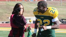 Missouri Southern senior Alley Broussard says goodbye to Hughes Stadium with family on hand before the Nov. 3 game against Truman State University. Broussard, from Lafayette, La., greets his girlfriend and daughter.
