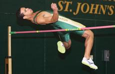 Junior Phillip Horn cleares the high jump bar on Jan 26. The bar was set at 6 foot 1 and a half inches.
