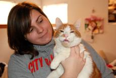 Meagan Haring, junior public relations major, holds her cat, Charlie, as she spends her final hours in Joplin before leaving for New Zealand on a semester-long study abroad program at Massey University in Wellington.
