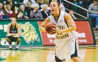 Senior Nicole Helfrich looks to pass in Southerns 74-59 win over Northwest Missouri State Feb. 28.
