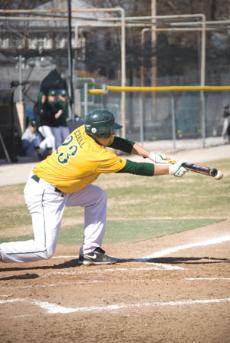 Senior Derek Ezell goes for the bunt during Southerns 6-4 win against Fort Hays on March 22.
