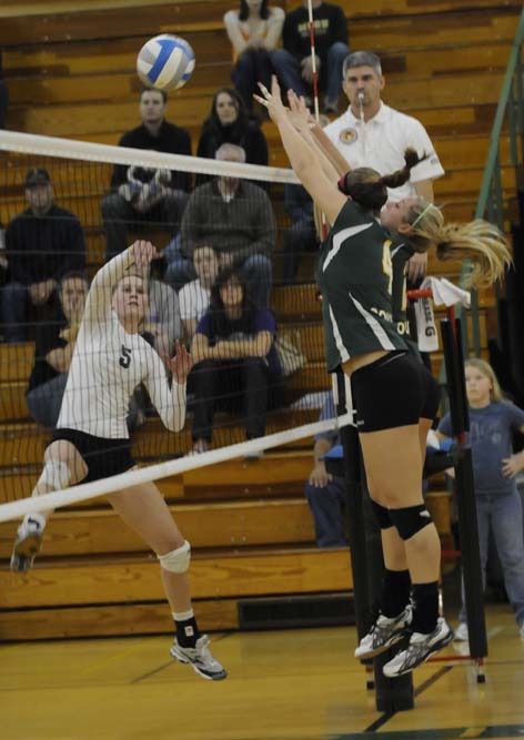 Rachel+Olinyk+and+Elin+Skei+jump+to+block+a+ball+in+the+Nov.+12+game+against+Southwest+Baptist.%0A