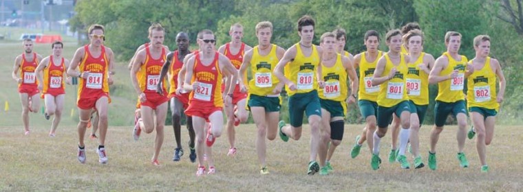 The men’s cross country team runs in a pack at the beginning of Wednesday’s dual meet held on Southern’s cross country course. The Lions beat PSU.
