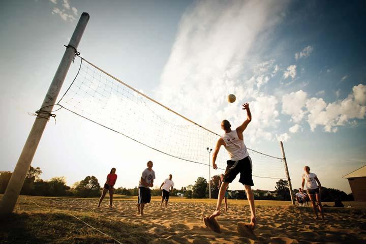 Senior+accounting+major+Ethan+Stenger+jumps+to+spike+the+ball+in+an+intramural+volleyball+match+Tuesday.+His+team%2C+Scurvy+Deception%2C+won+the+match.%0A