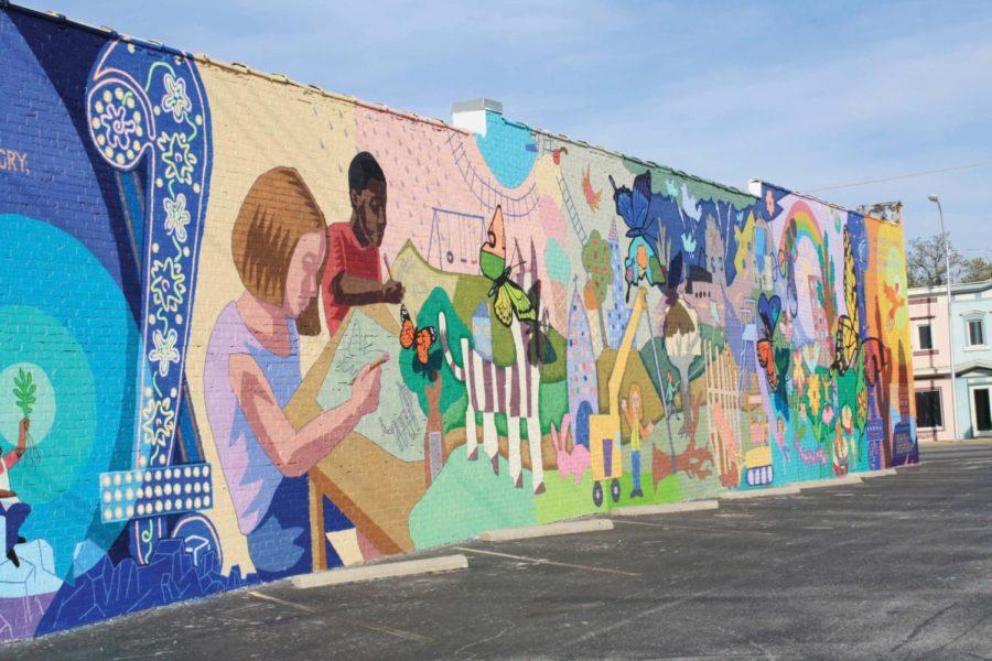 The mural on 15th and Main streets in Joplin was painted by the community on the side of Dixie Printing.
