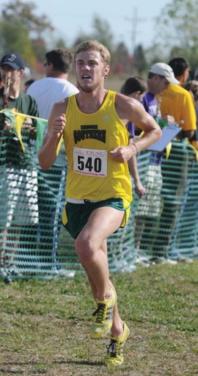 Junior public relations major Sam Pogue runs in the Oct. 22. The Lions will compete in the Regional meet this weekend.
