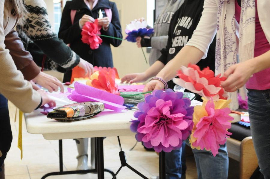 Students are making flowers to give to their Valentine in celebration of Valentine’s.
