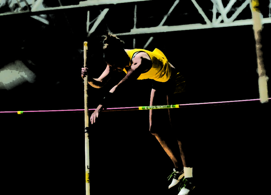 Sophomore Melanie Bower vaults herself over the bar at the MSSU Lion Invite on Feb. 2.
