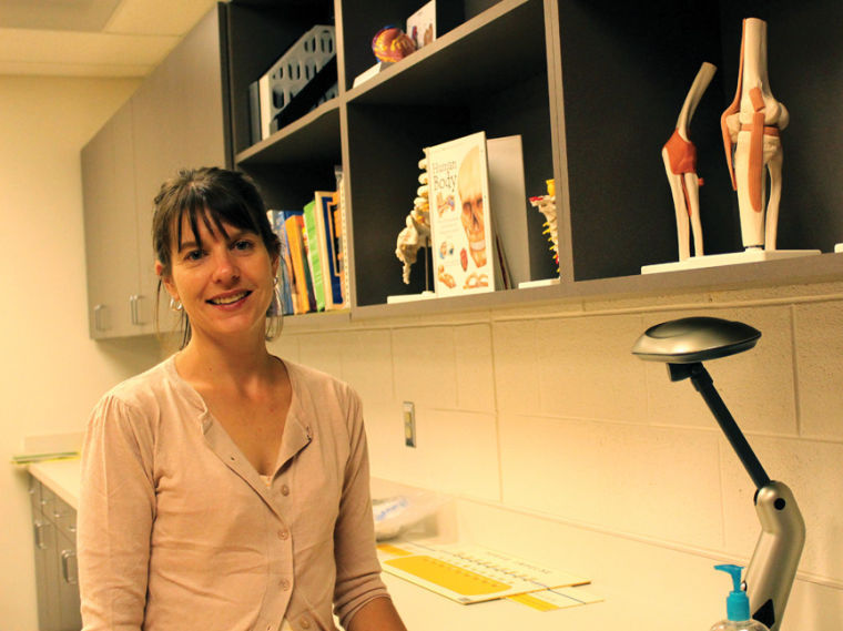 New assistant professor of kinesiology, Dr. Andrea Hacker, in the Kinesiology Lab.