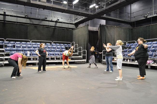 Students go through physical warm-ups in preparation of the Southern Theatre Department’s upcoming Commedia dell’Arte performances.