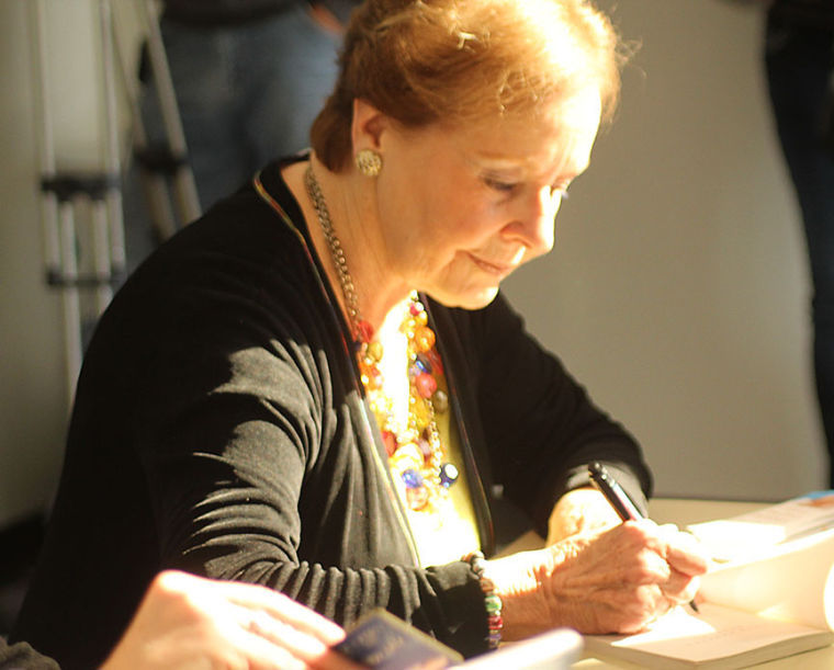 Marion Blumenthal Lazan signs copies of her book Four Perfect Pebbles: A Holocaust Story - a Message of Perseverance, Determination, Faith and Hope. She spoke about her experience in Corley Auditorium, Nov. 18.